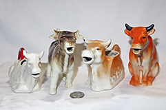 Four Czechoslovakian cow creamers