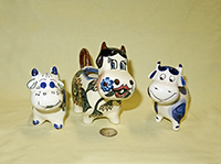 Three Polish cow creamers