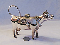 Ornate silver cow creamed by Garrard