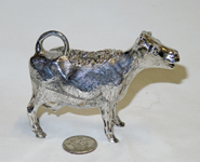 Itanmlan cow creamer, side