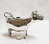 Silver cow creamer with Schuppe-like legs and pseudomarks