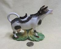 Stevenson & Hancock black and white porcelain cow creamer, side