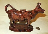 Rockingham glazed cow creamer