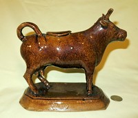 Large Rockingham glazed cow creamer