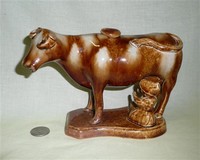 Flint enamel Rockingham glaze cow creamer with milkmaid