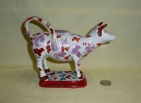 Probable Glamorgan cow creamer, right