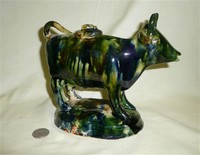 Green glazed cow creamer, riight