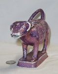 Purple lustre cow creamer, front