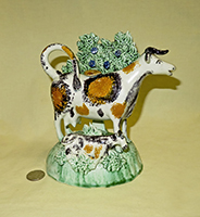 Large Tittensor Cow creamer wiuth boscage