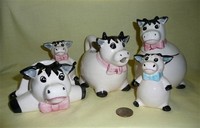 Cow sugar, creamer, S&P and napkin holder set