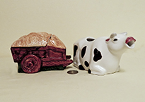 lying cow creamer with wagon sugar