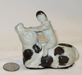 Porcelain Suiteki of boy on water buffalo