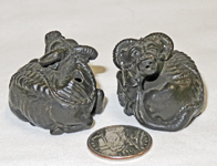 Two small
Japanese sleeping water buffalo suiteki