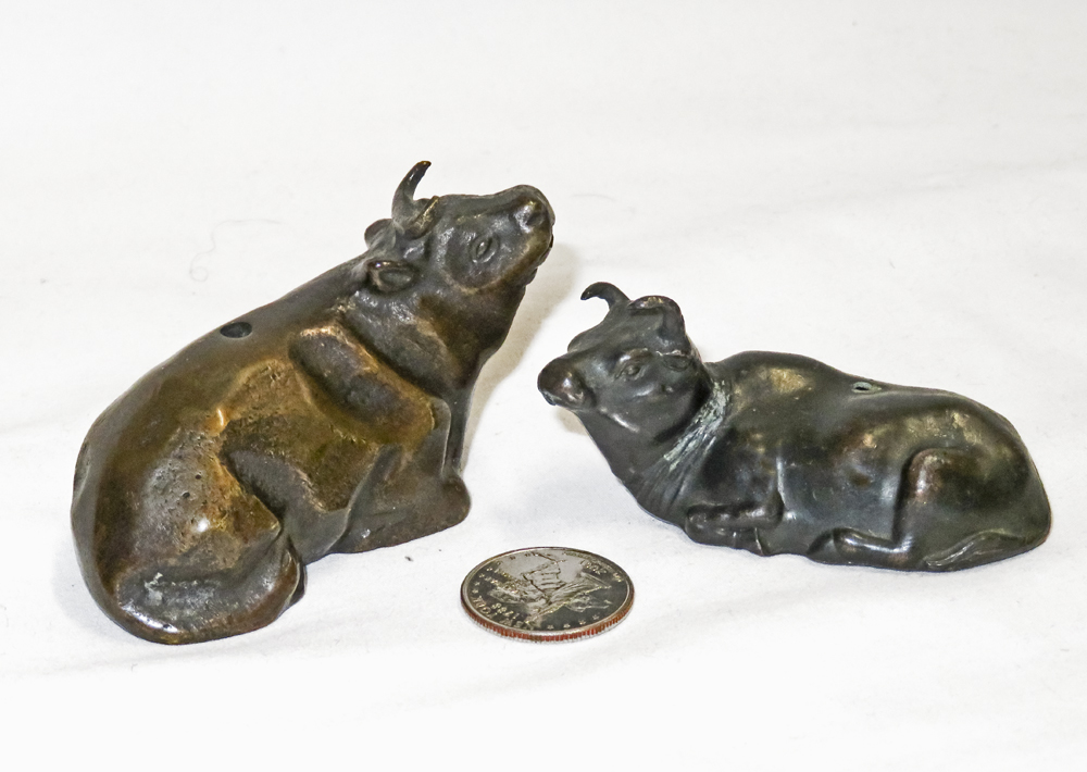 Two Japanese bronze cow suiteki