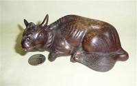 Japanese bizen ware bull suiteki with Buddha