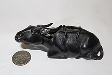 Japanese bronze waterbuffalo suiteki, left