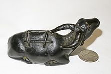 Japanese bronze waterbuffalo suiteki, left