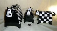 Rectangular shaped cow caricature teapot set with checkerboard design