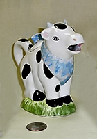 Small cow teapot with blue bandanna