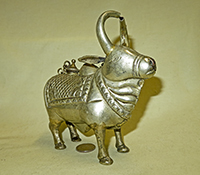 Nandi holy water pot pours through horns