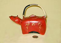 Red japanese cow caricature teapot