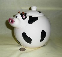 Spherical cow teapot with tiny horns