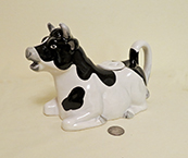 kneeling b&w cow teapot