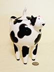 Spherical body and very long thin leggs cow creamer