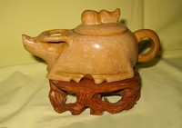 Smnall brown stone Chinese water buffalo teapot on wooden stand